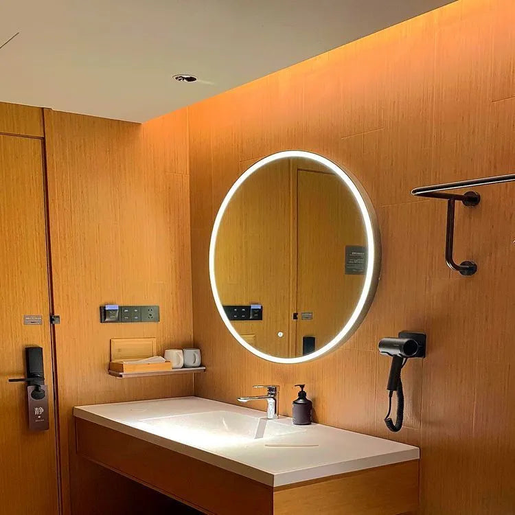 Round black aluminium framed wall mirror with integrated LED lighting and touch controls.