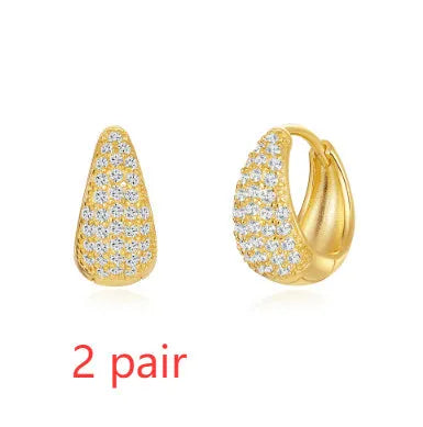 Brass diamond earclip earrings with geometric shape and gold electroplated finish