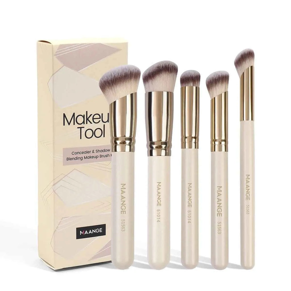 Five apricot coloured makeup brushes with angled blush brush design on white background