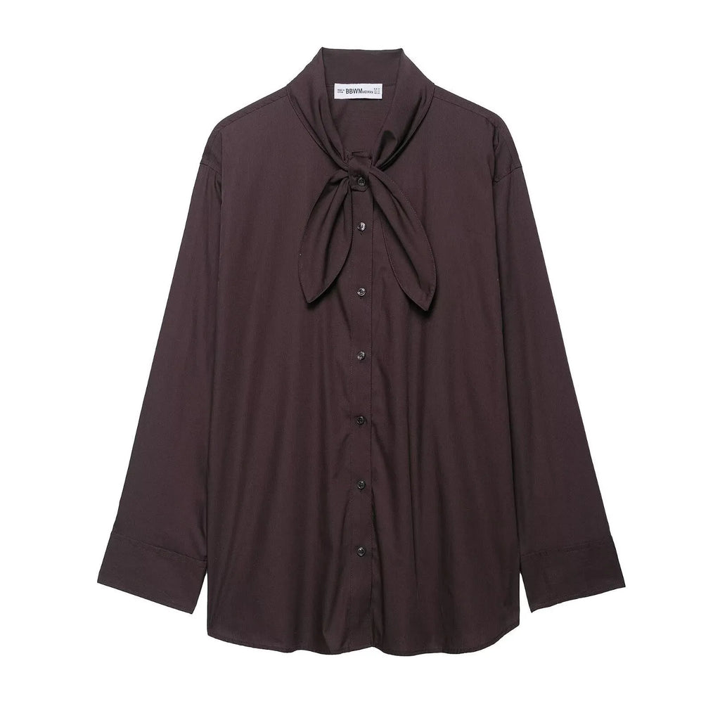 Brown women's loose fit poplin shirt with long sleeves and an integrated bow tie scarf at the neck.