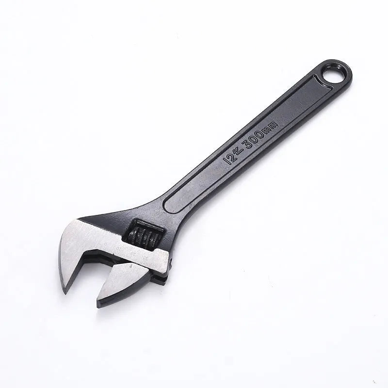 High carbon steel adjustable open-end wrench with blackened finish on a grey background.