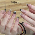 Sweet Girl Wearing Fake Nails press-on artificial nail sets in random colours for DIY application.