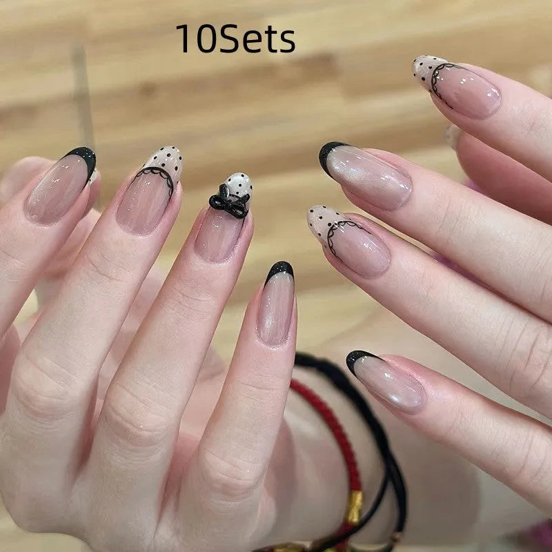 Sweet Girl Wearing Fake Nails press-on artificial nail sets in random colours for DIY application.