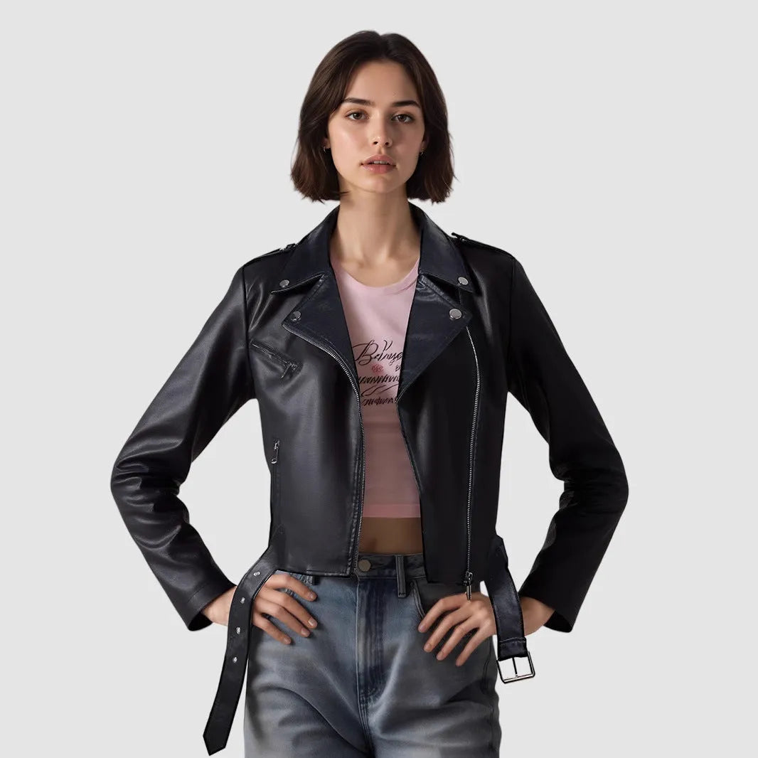 Women's black PU leather motorcycle jacket with lapel collar and a short belt fastened.