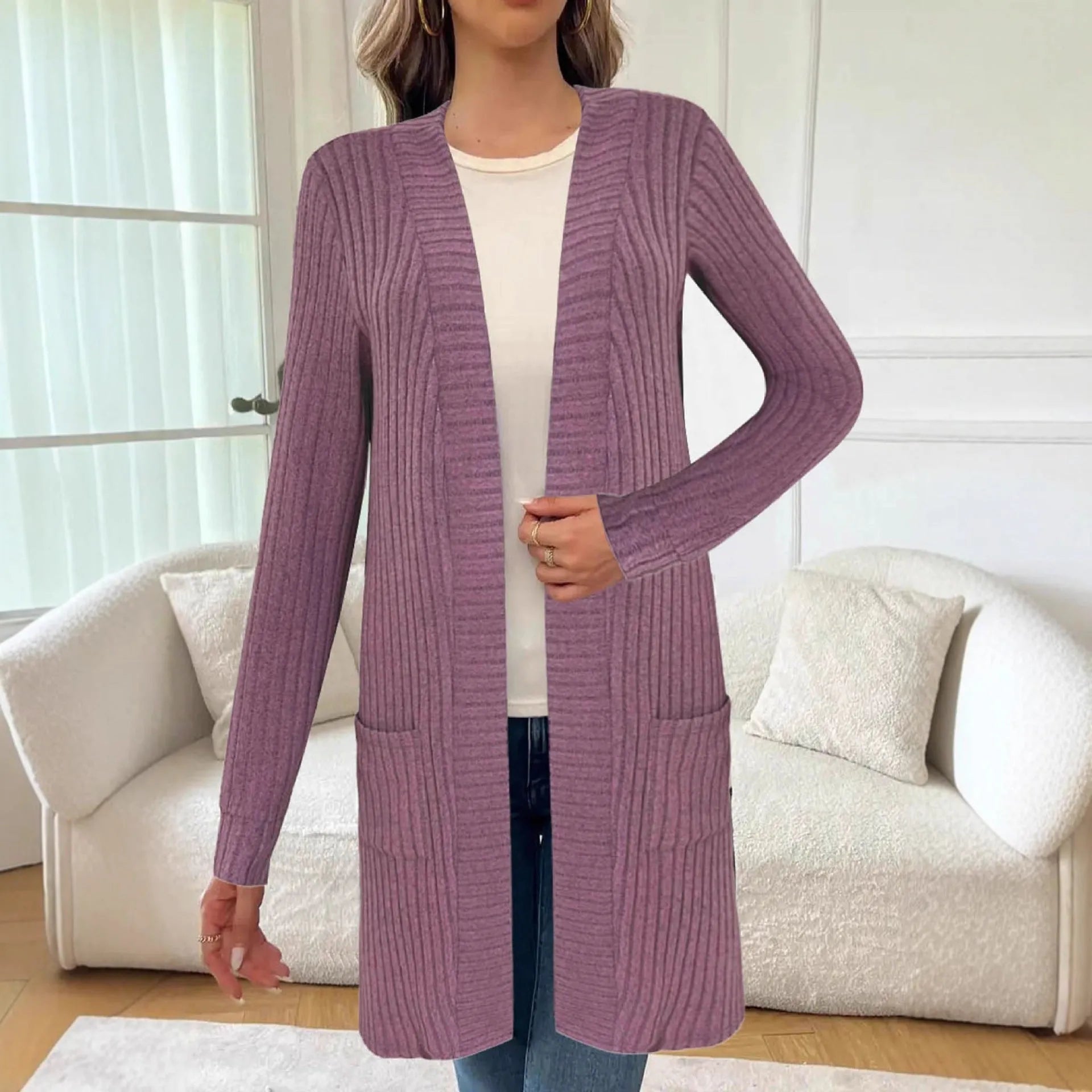 A loose-fitting long sleeve knitted cardigan jacket for plus sizes, shown in black, gray, or wine red.