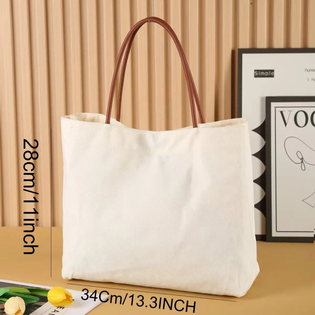 Natural cotton canvas tote bag with double handles in a neutral colour