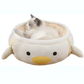 Green chick-shaped cat bed shown both flat and hanging as a hammock, suitable for small pets.