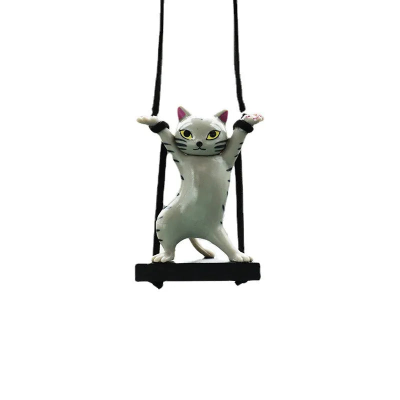 Cartoon-style resin cat pendant on an adjustable rope for car interior decoration.