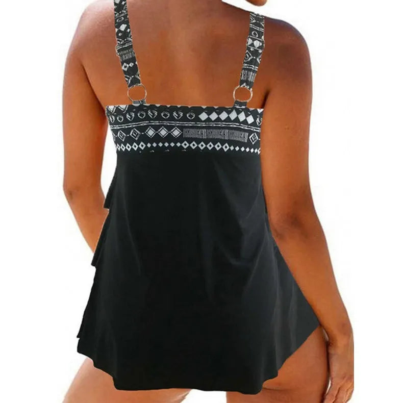 Women's plus-size sleeveless swimsuit with double shoulder straps and a bow in a split design.