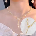 Pearl white alloy necklace with flower pearl charm and rose floral design elements on pearl chain