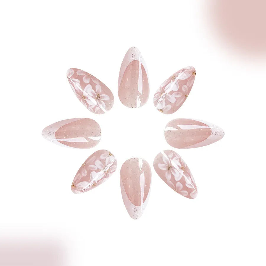 C625 short almond shaped false nails with French style glittering powder flower design