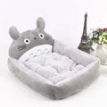 Cartoon-style washable pet bed sofa for small dogs and cats in a choice of colours.