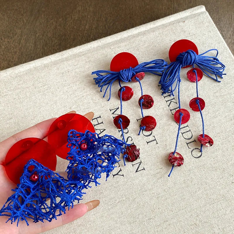Women's geometric cloth earrings with silver needle colour and blue resin flower accents