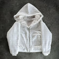 Baggy cardigan-style coat in black or white with long sleeves and loose fit