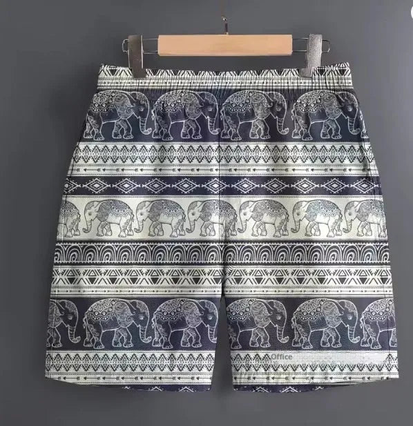 Men's casual polyester shorts in a camouflage pattern, shown in a relaxed outdoor setting.