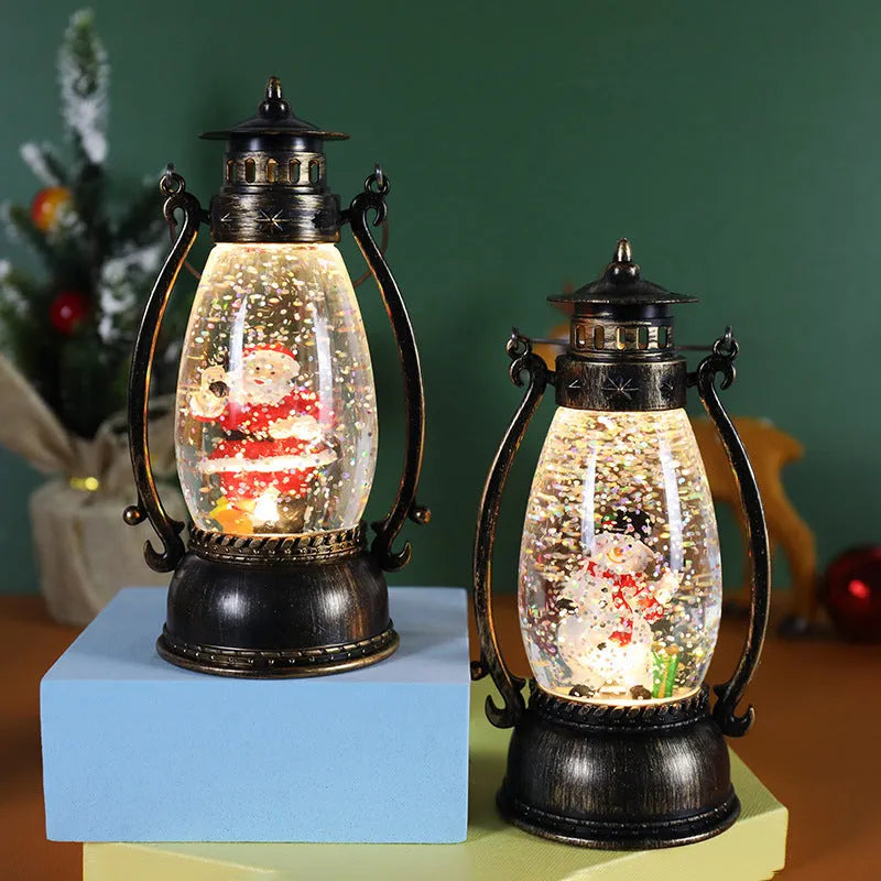 LED crystal ball Christmas decoration with illuminated oil lamp snowman figure on tabletop