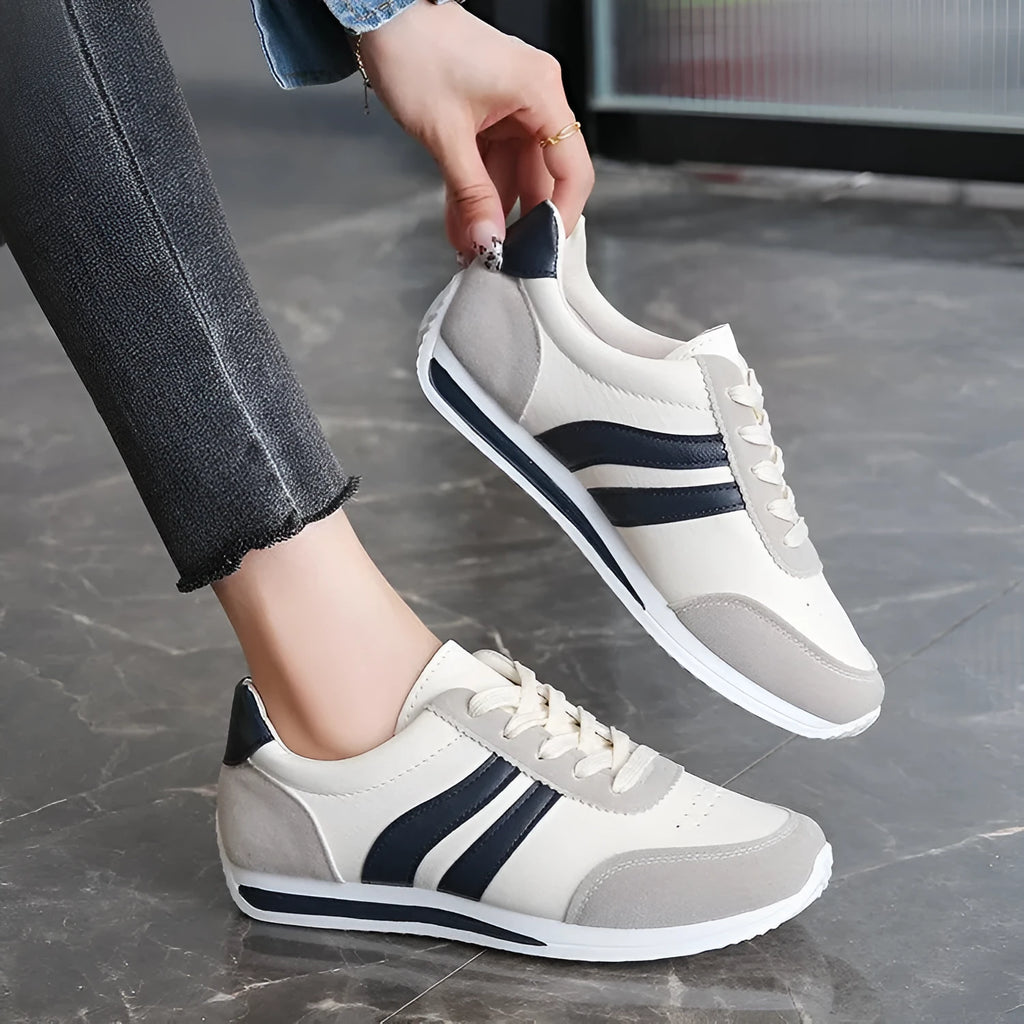 Red and blue lace-up leisure sneakers with soft rubber soles and mesh upper