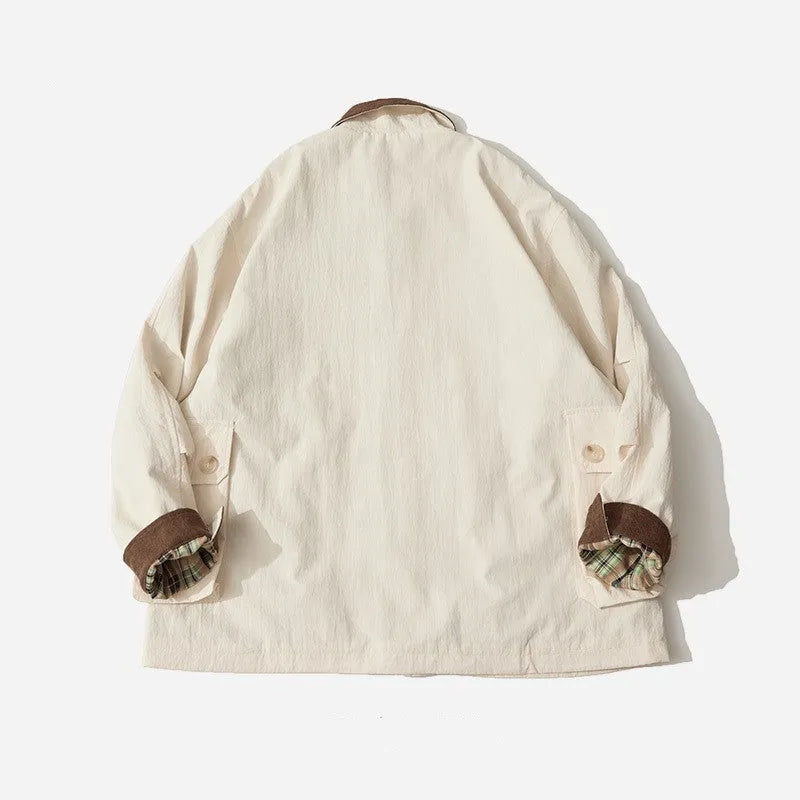 Men's and women's solid colour casual jacket with side seam pockets in green or apricot.