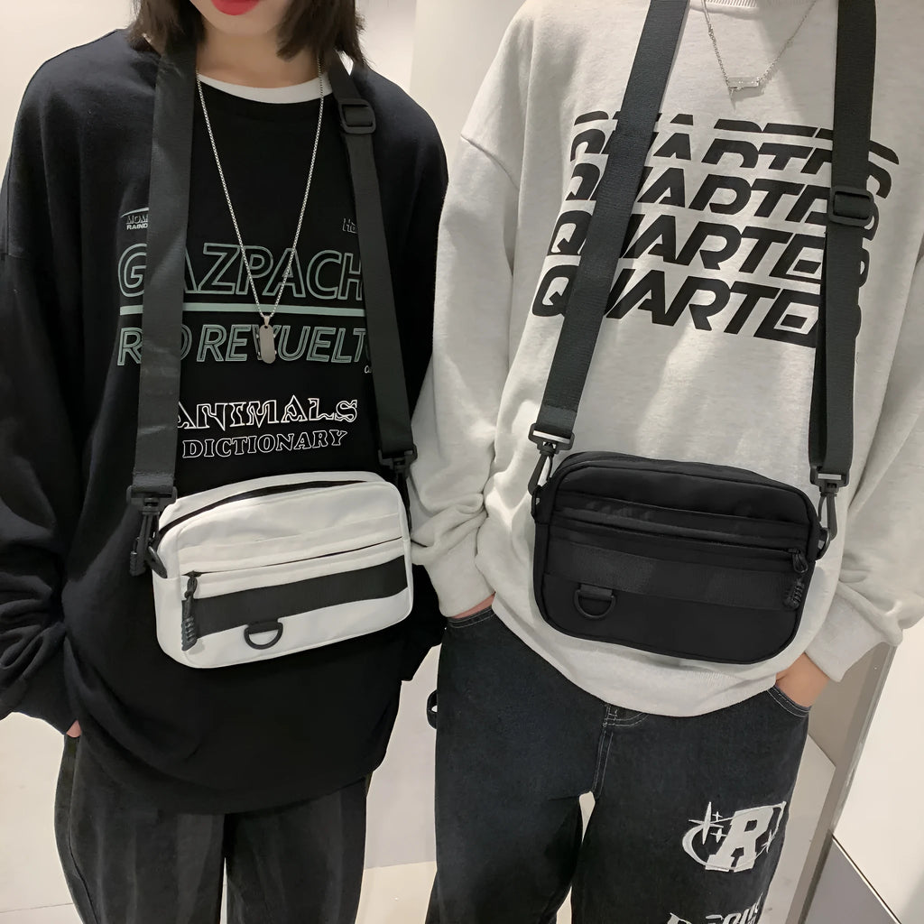 Men's street-style nylon messenger bag in a solid colour with adjustable crossbody strap.