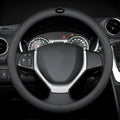 Black leather steering wheel cover with two-colour line detailing showing Napa leather texture and rubber inner ring