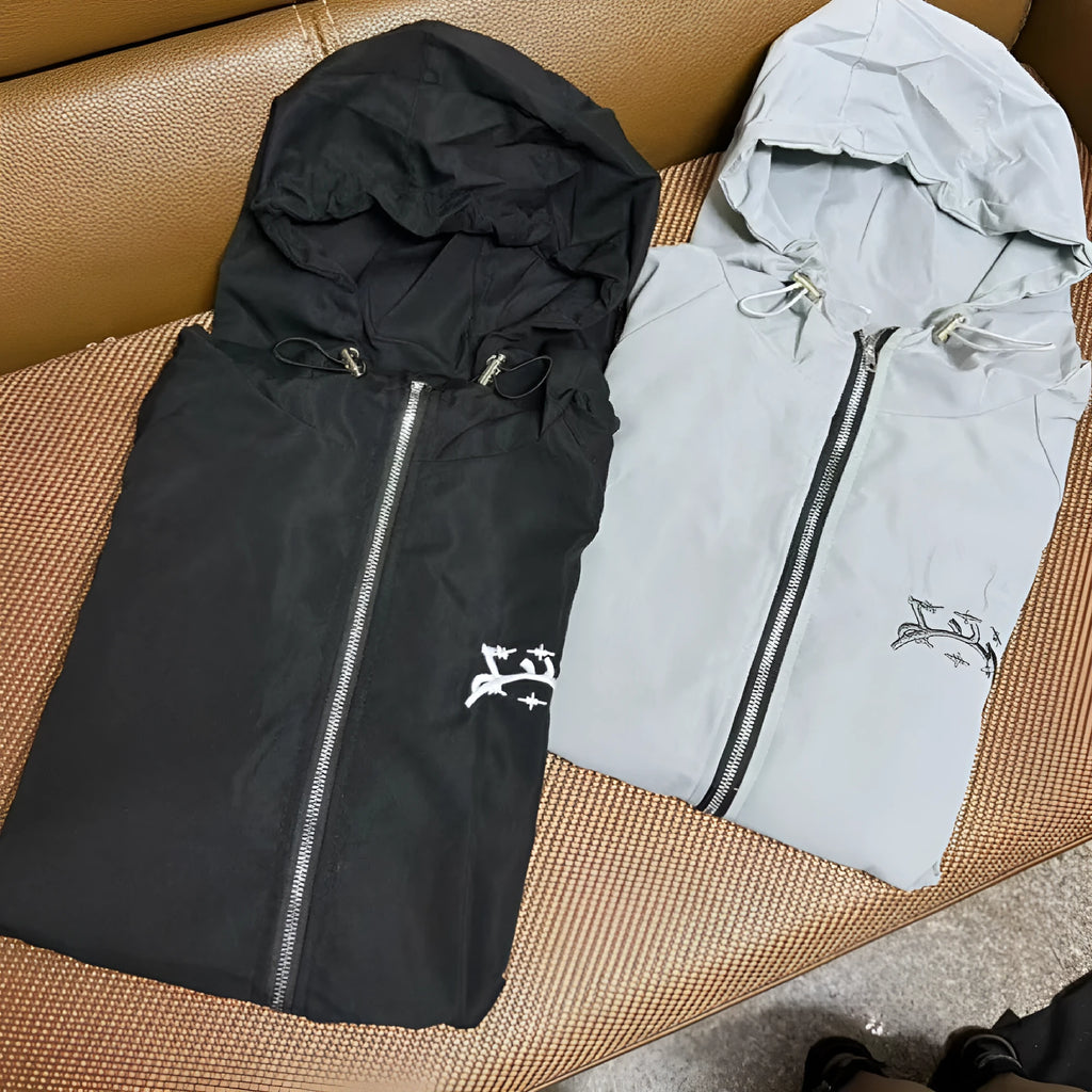 Men's loose fit hooded sunscreen jacket in British style polyester fabric, black colour option