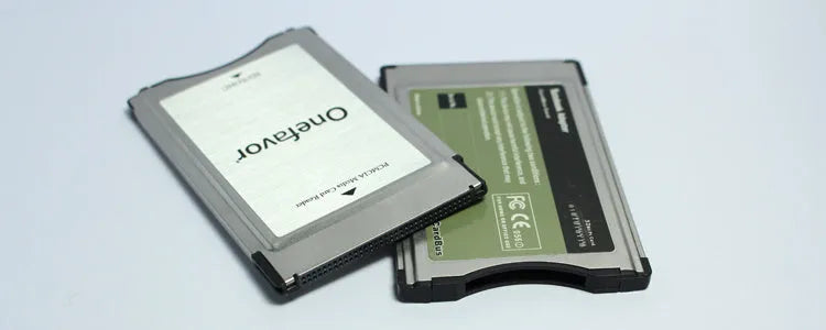 Stainless steel SD to PCMCIA adapter card with a 32GB SDHC card for Mercedes-Benz vehicles.