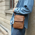 Men's brown genuine leather crossbody shoulder bag with adjustable strap