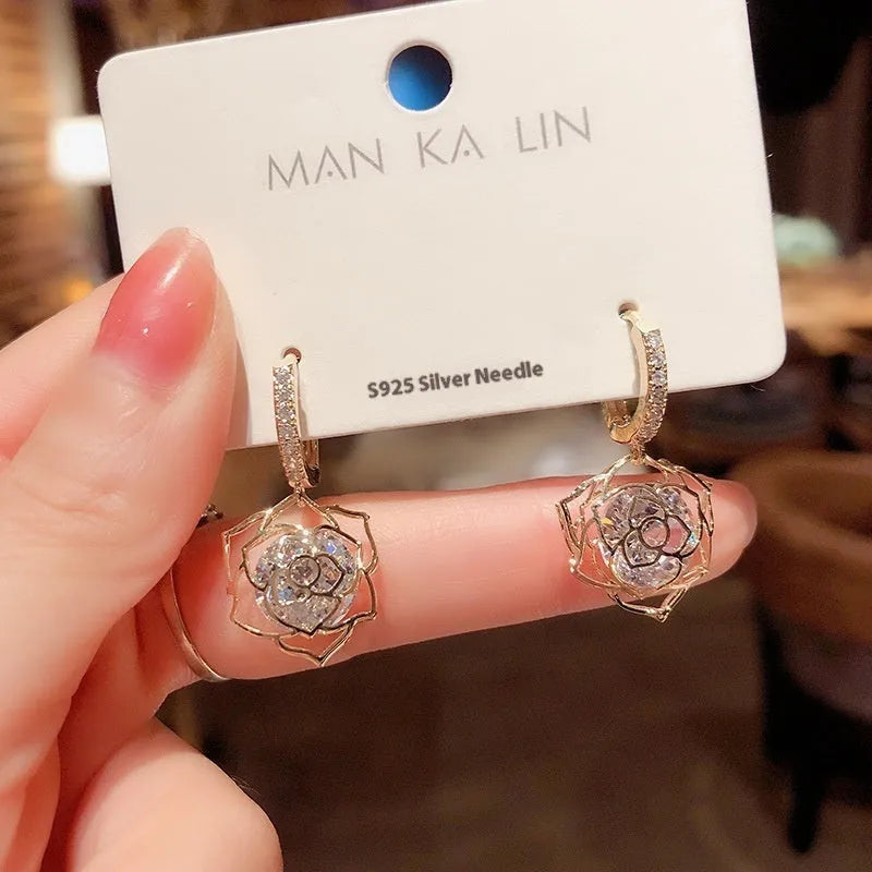 Copper geometric rose earrings for women with electroplated zircon finish in multiple colour options