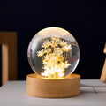 3D dandelion eternal flower inside a luminous resin crystal ball on a beech wood stand base.