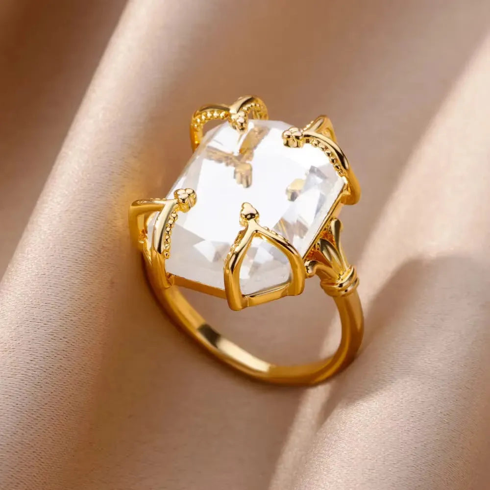 18K gold plated copper open mouth ring with synthetic zircon love emerald motif on white background