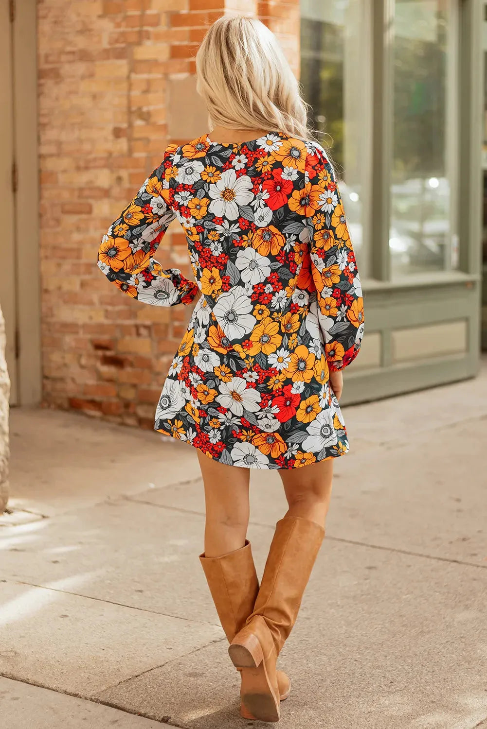 Orange floral print striped lace V-neck long sleeve mini dress on hanger