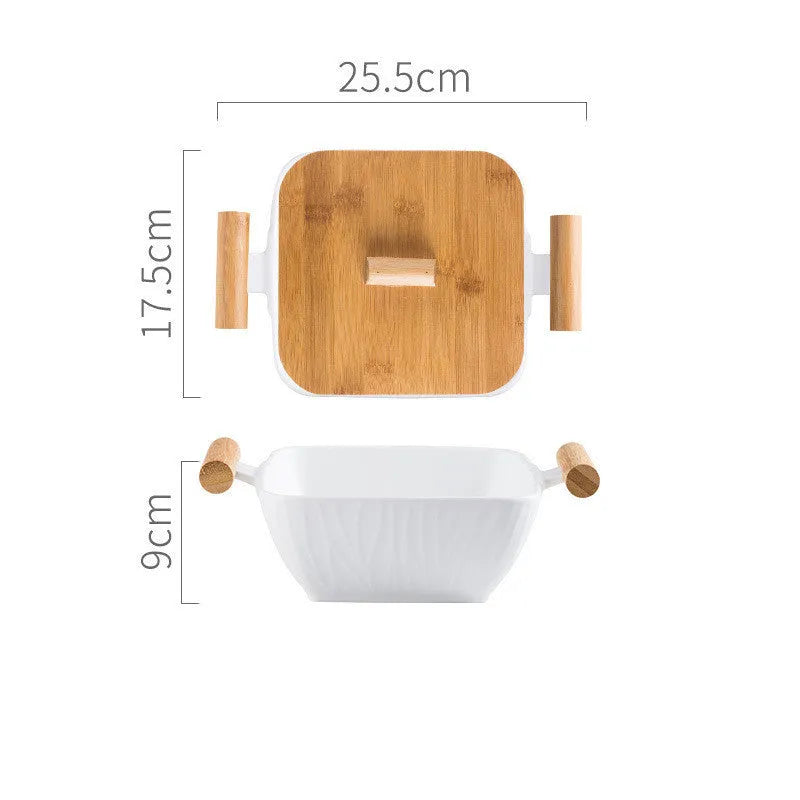 Ceramic bowl with irregular shape and matching lid in heat-resistant porcelain