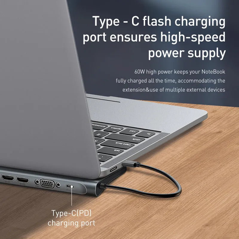 Grey ten-port USB-C hub docking station with cooling bracket showing HDMI, VGA and Ethernet ports