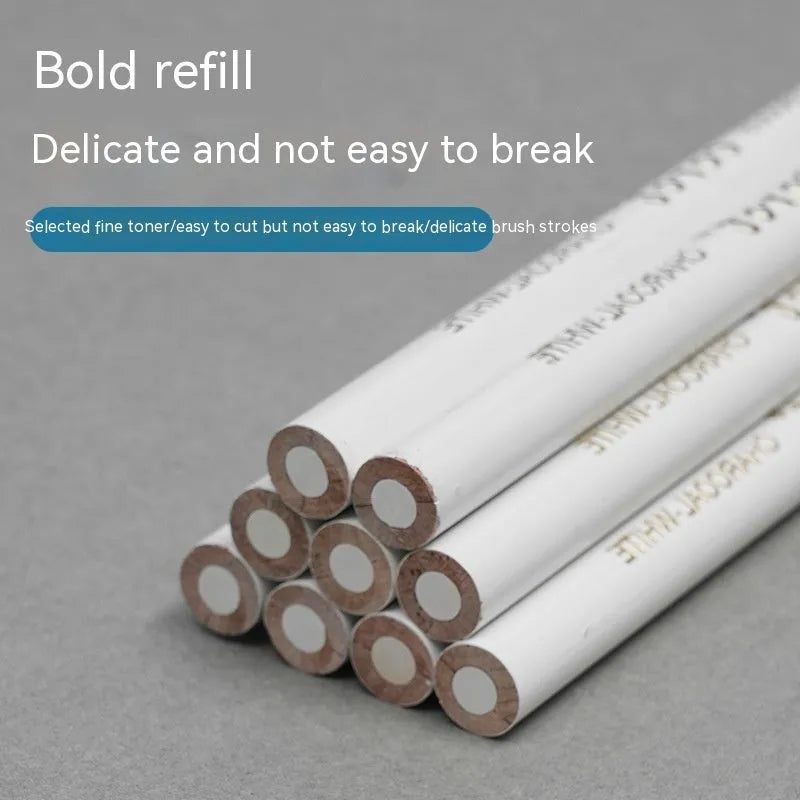 Set of three white charcoal pencils with wooden barrels for highlighting and sketching