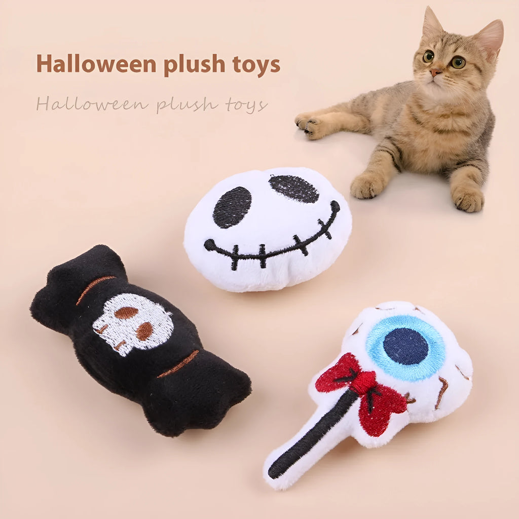 Small plush cat teaser wand with candy and skull designs for indoor play
