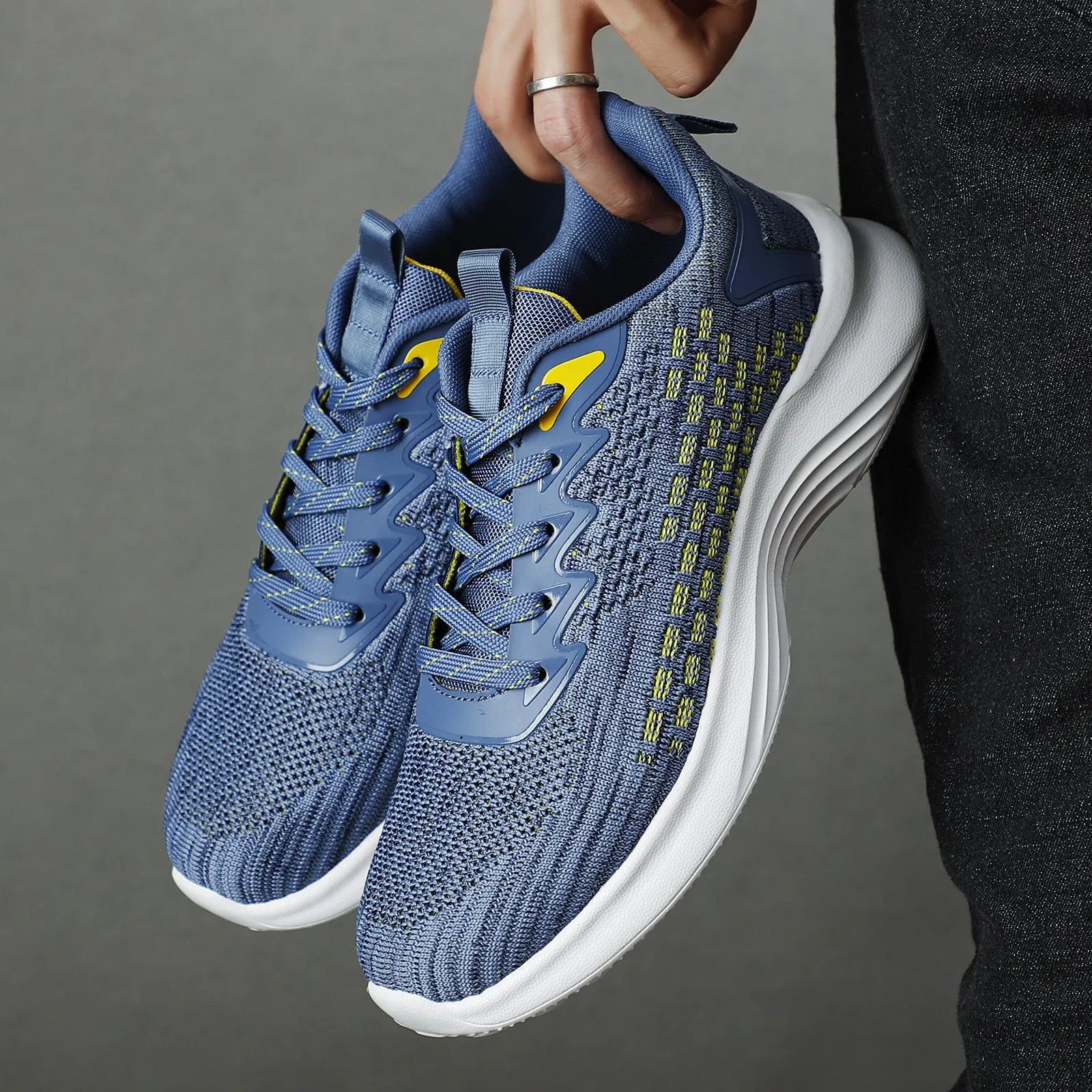 Women's lavender purple Flyknit mesh running shoes with round toe and flat wedge heel on a white background.