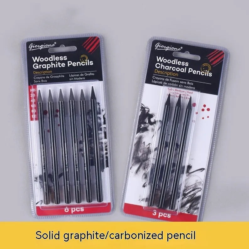 Set of nine wooden artist pencils including graphite and carbonized types on suction card packaging