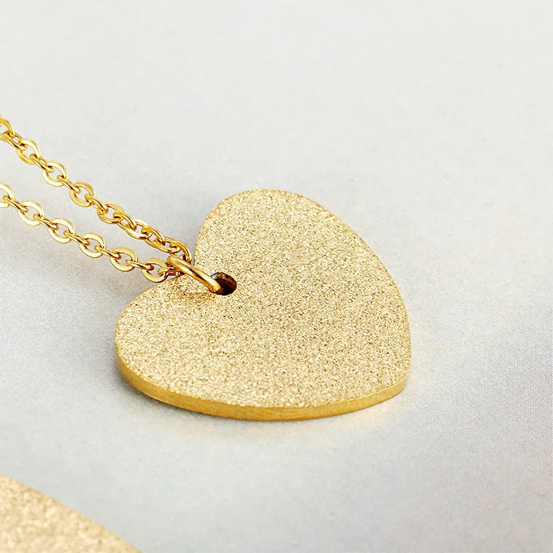 Women's titanium steel geometric heart-shaped pendant necklace in colour KN25736-Z.