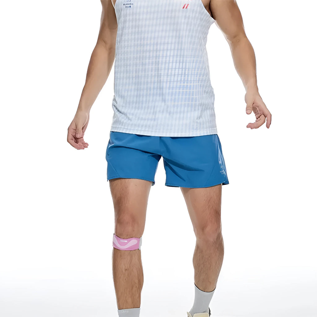Close-up of black four-point stretch running shorts showing laser stitching detail on spandex fabric.