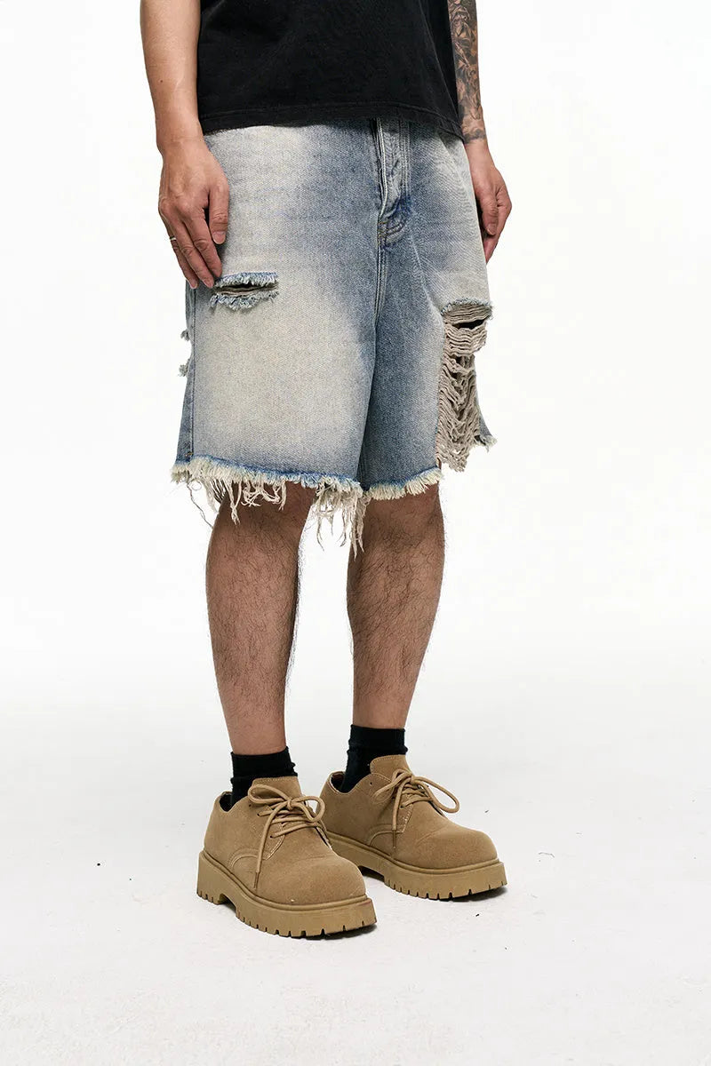 Men's light blue retro washed denim shorts with baggy wide-leg design and fifth pants length