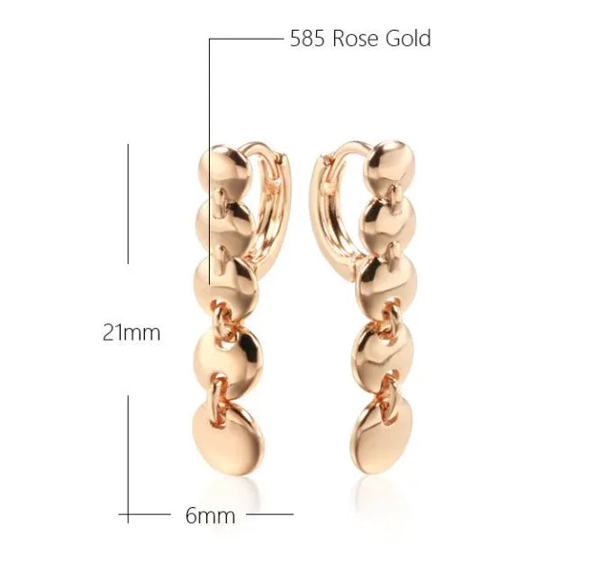 A pair of gold-coloured retro long circle earrings with a woven texture, for pierced ears.