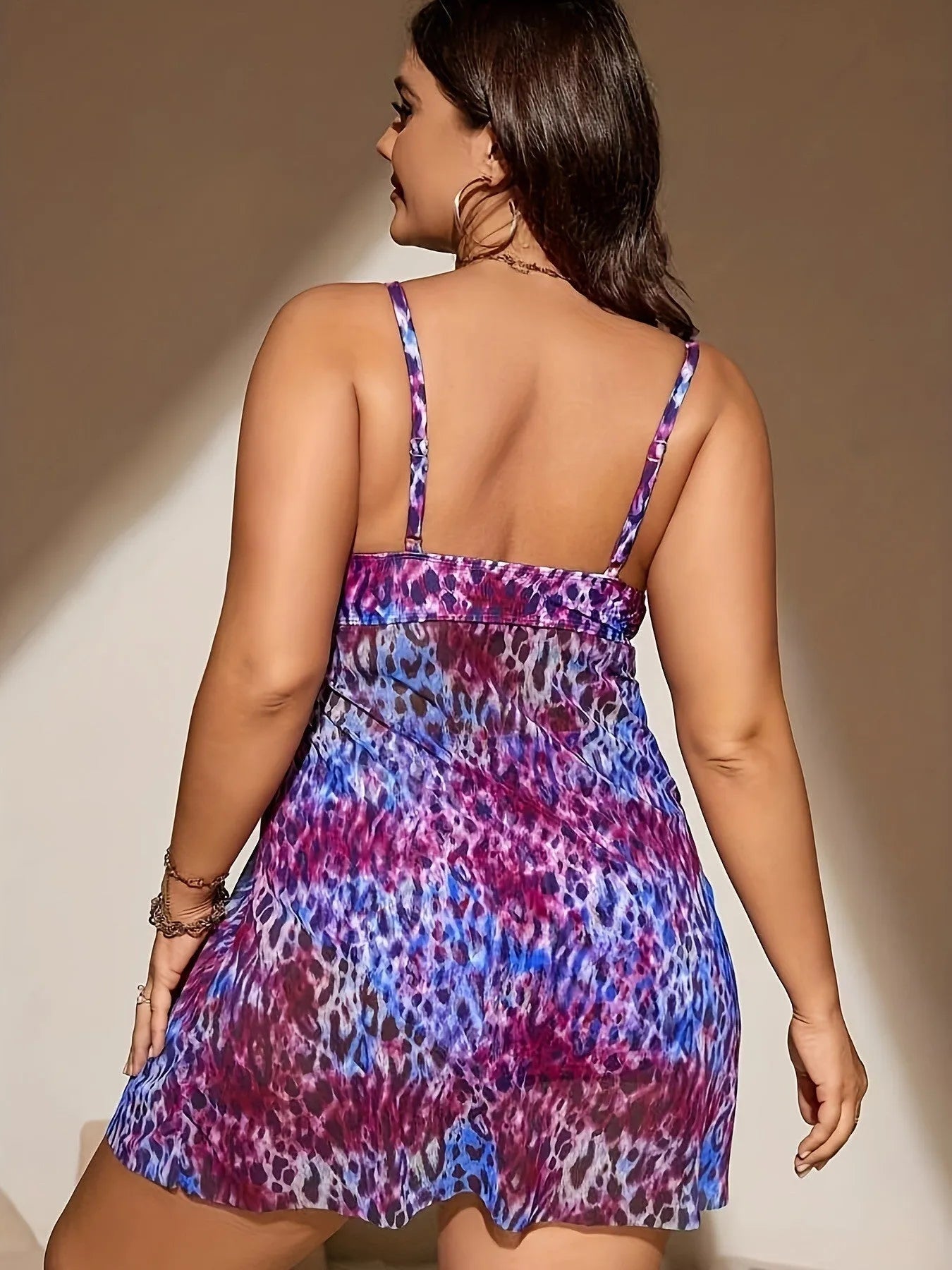 Plus size women's bikini set with split skirt design in red, rose red, blue, and purple colours