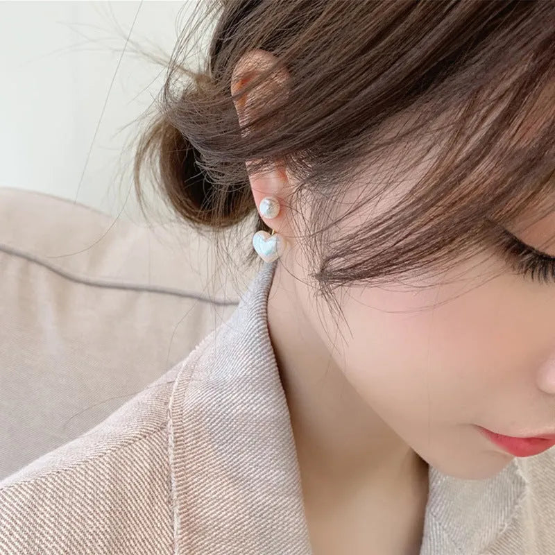 Heart-shaped pearl stud earrings with electroplated alloy construction and Korean-style design