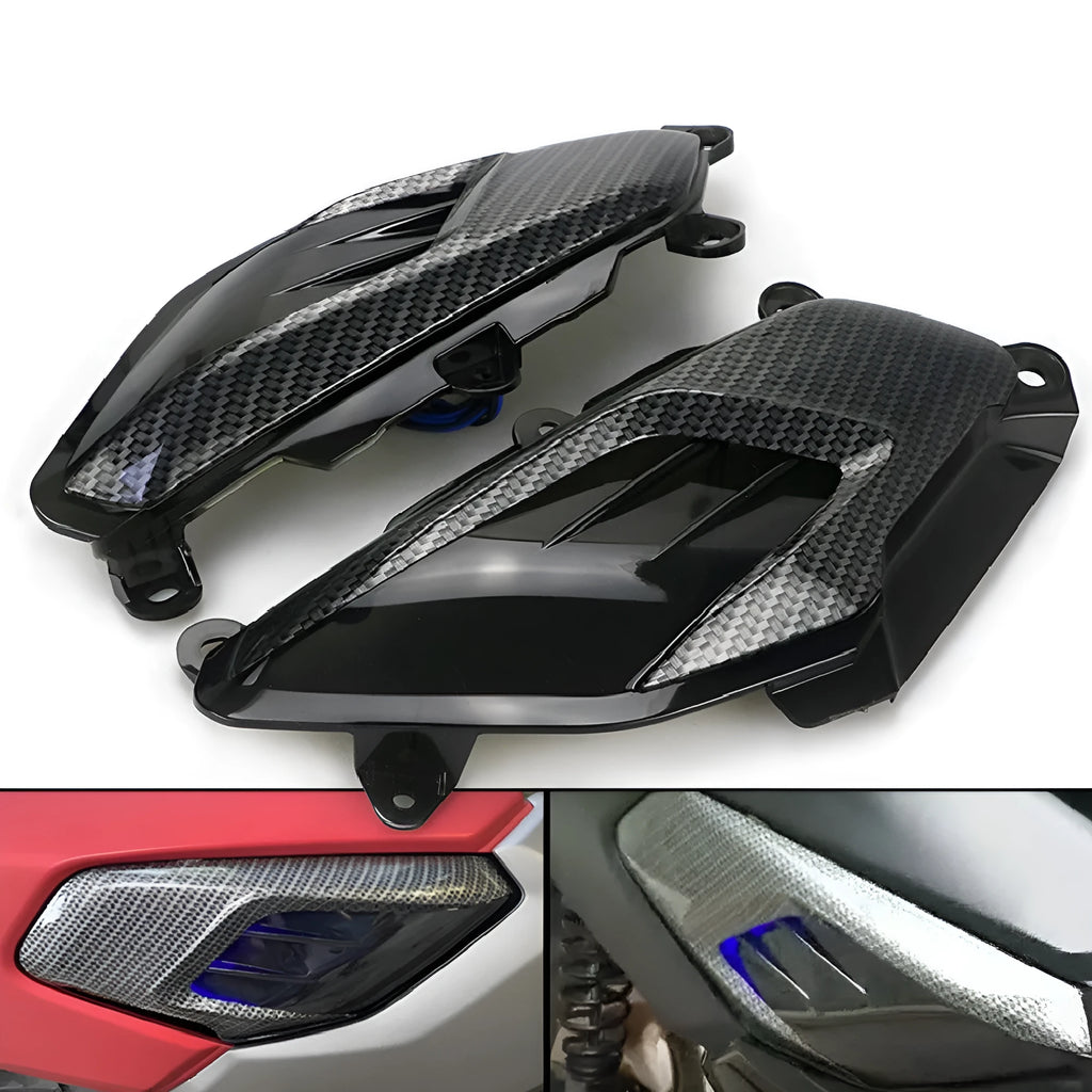 Yamaha NMAX side lamp replacement kit showing ABS plastic shell, PVC lamp shade, and stainless steel screws
