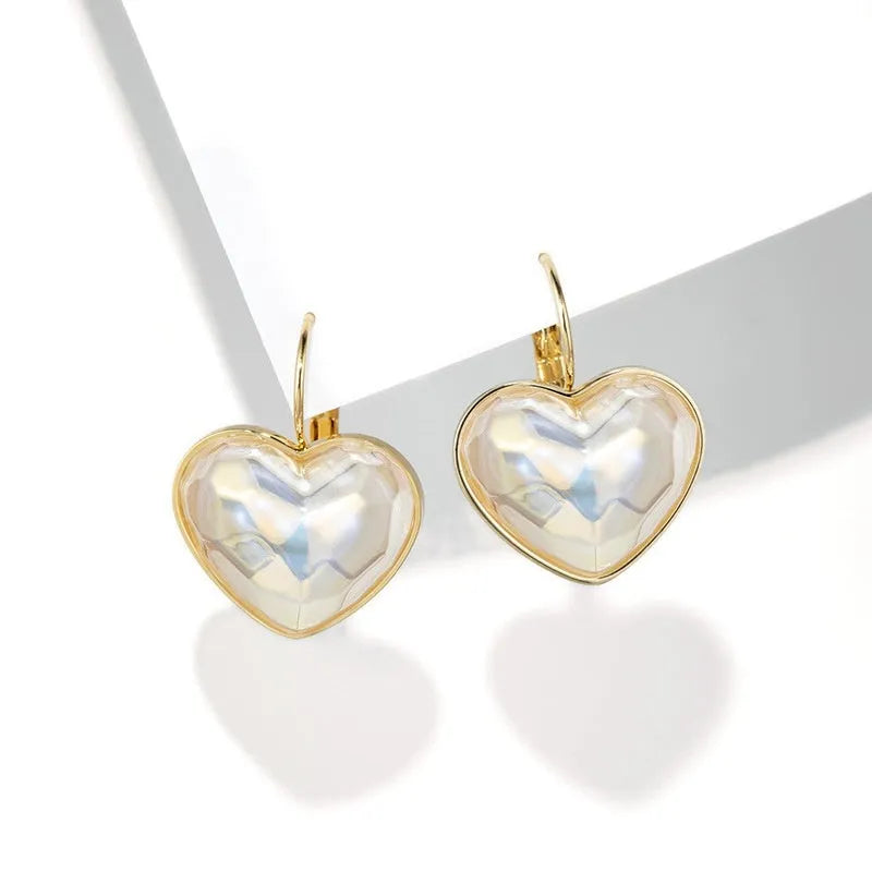 Gold-coloured alloy ear clip earrings with summer fashion design for women