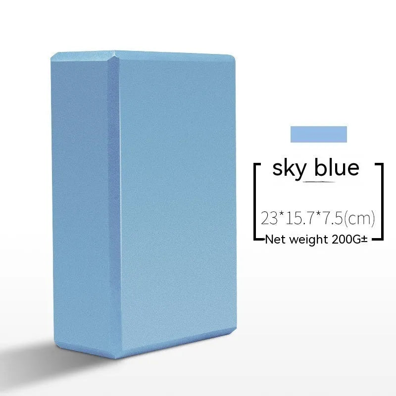 EVA foam yoga block in violet colour, shown next to a pink block, demonstrating its size and rectangular shape for fitness support.