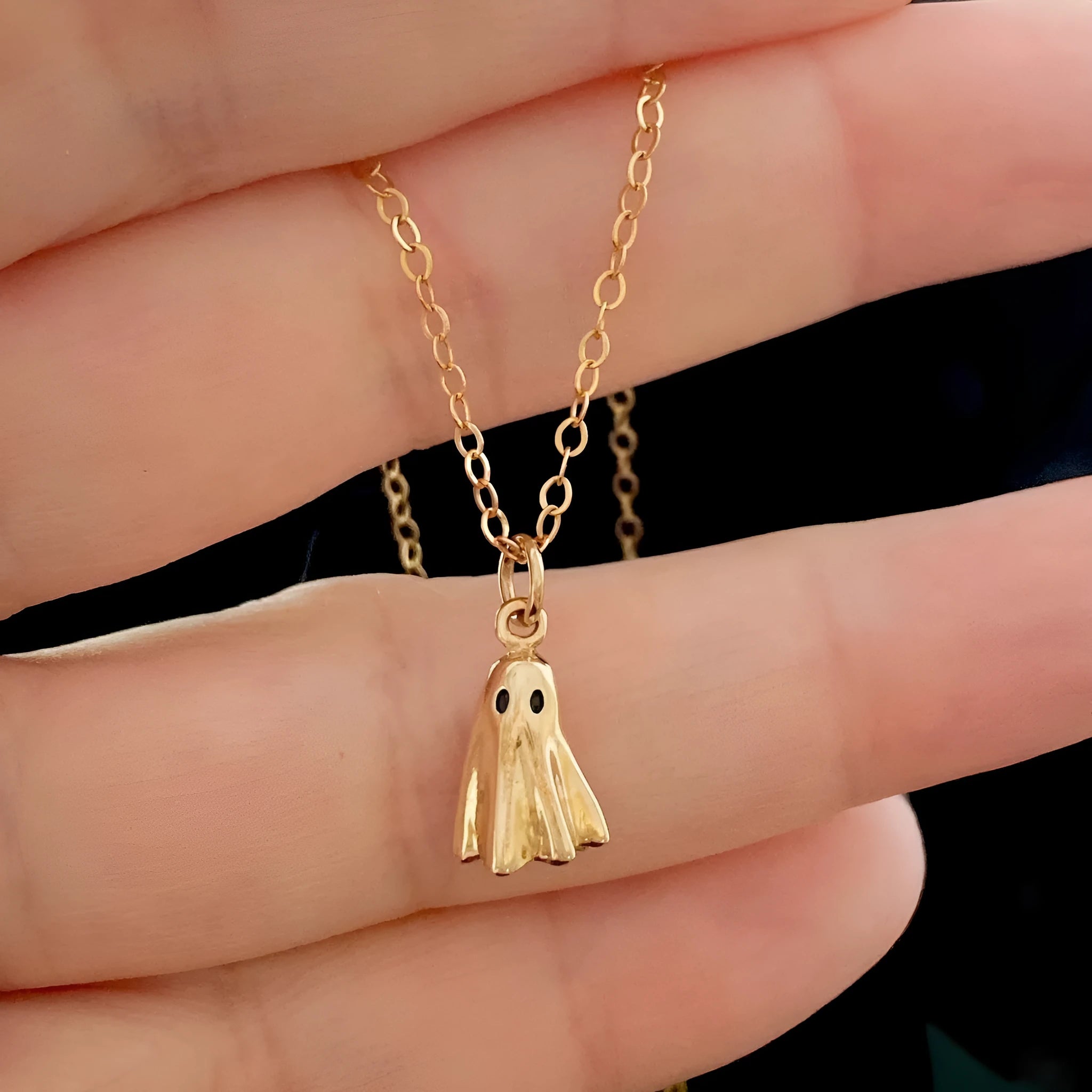 Women's ghost pendant necklace with titanium steel construction and twisted chain