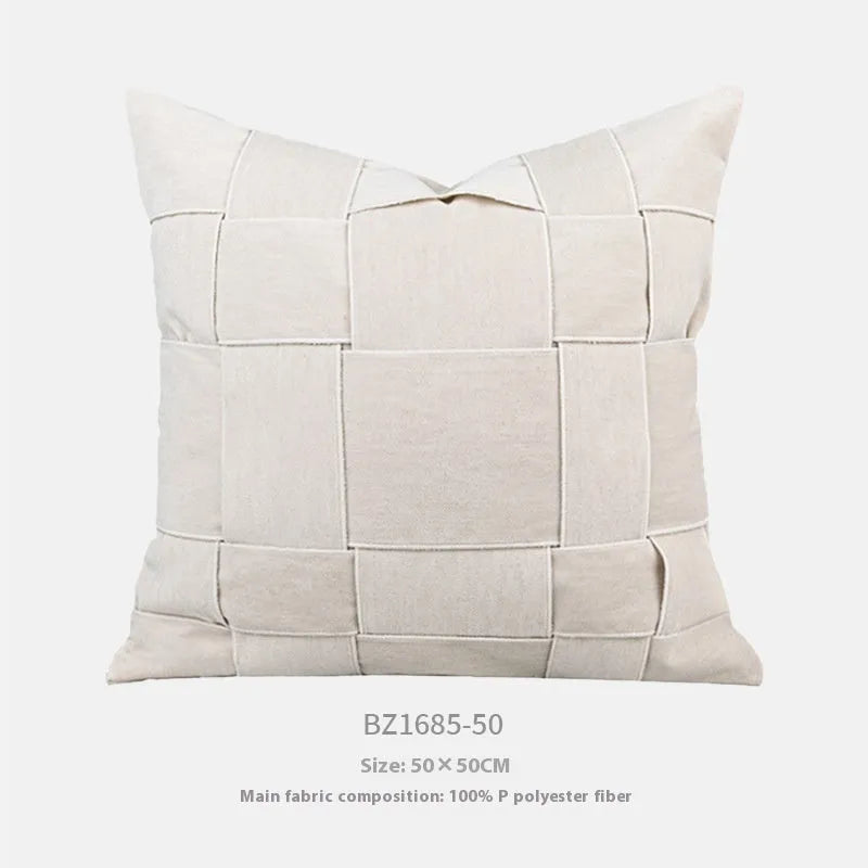 50cm square chenille woven pillow cushion in a choice of seven colours on a sofa.