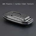 Transparent plastic protective shell for car key remote control showing key through clear material