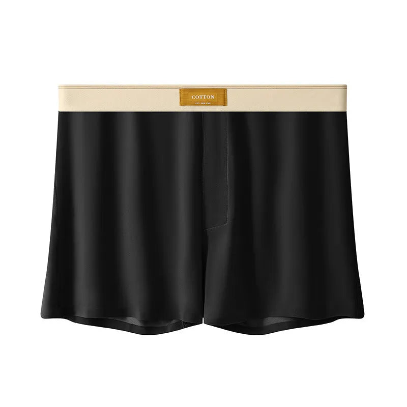 Pack of men's solid colour ice silk boxer shorts showing loose fit and mid-waist design.